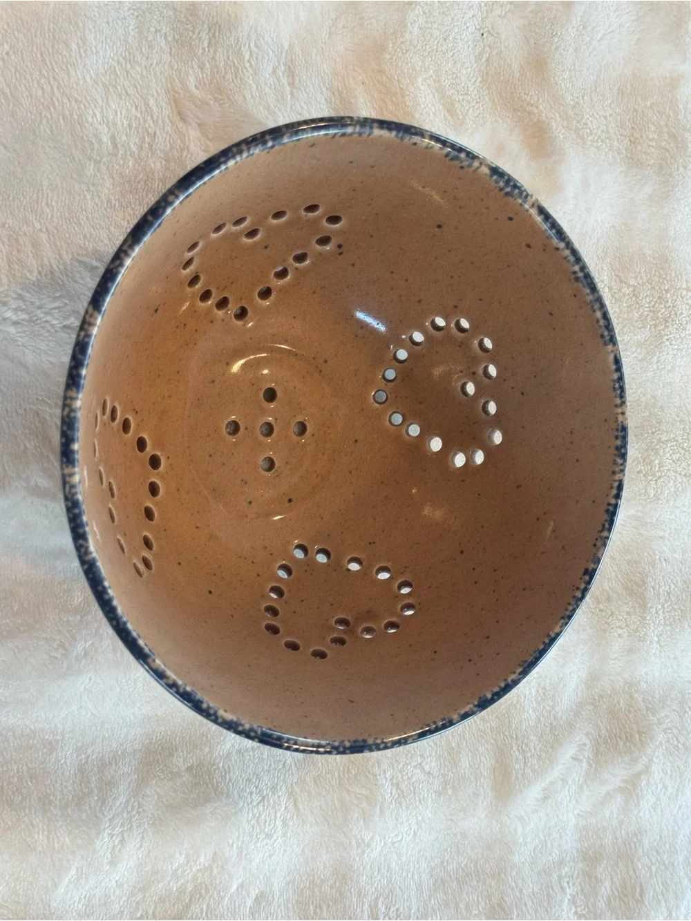 Vintage handcrafted pottery colander